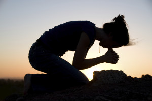 praying on knees