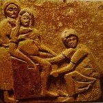 midwife assisting in birth