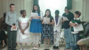 Children praying Grace After the Meal