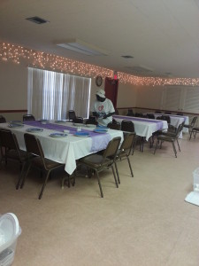 Paulette helping set the tables