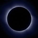 new moon surrounded by ring of light